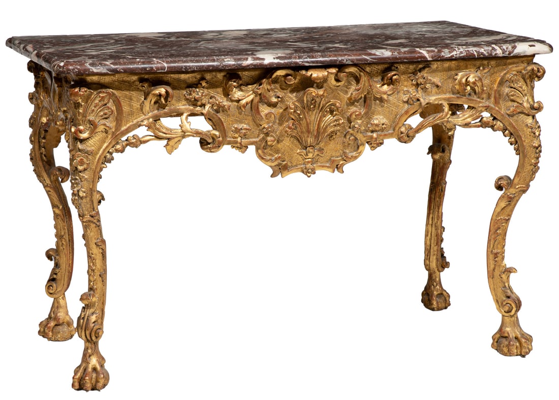 Fine George II Carved Giltwood Console: Fine George II Carved Giltwood Console, 18th c., probably Irish, molded marble top, scrolled foliate frieze centered by Prince of Wales Plumes, cabriole legs with foliate carvings, ball and claw feet3