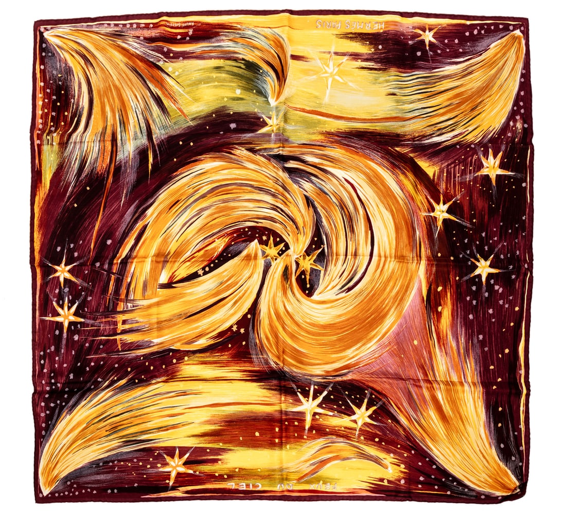 Hermès "Feux du Ciel" Silk Scarf 90: Hermès "Feux du Ciel" Silk Scarf 90designed by Kuwami Sefedin, labeled, 35 in. x 35 in. (As this scarf is hand-rolled, the dimensions indicated may vary.); with original Hermès box