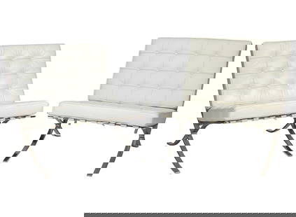 Near Pair of Mies van der Rohe-Style Barcelona Chairs: Near Pair of Mies van der Rohe-Style Barcelona Chairs , white leather and chromed steel, slightly different leather/ cushion design, h. 30, w. 30, d. 30, and h. 32 in., w. 30 in., d. 30 in.