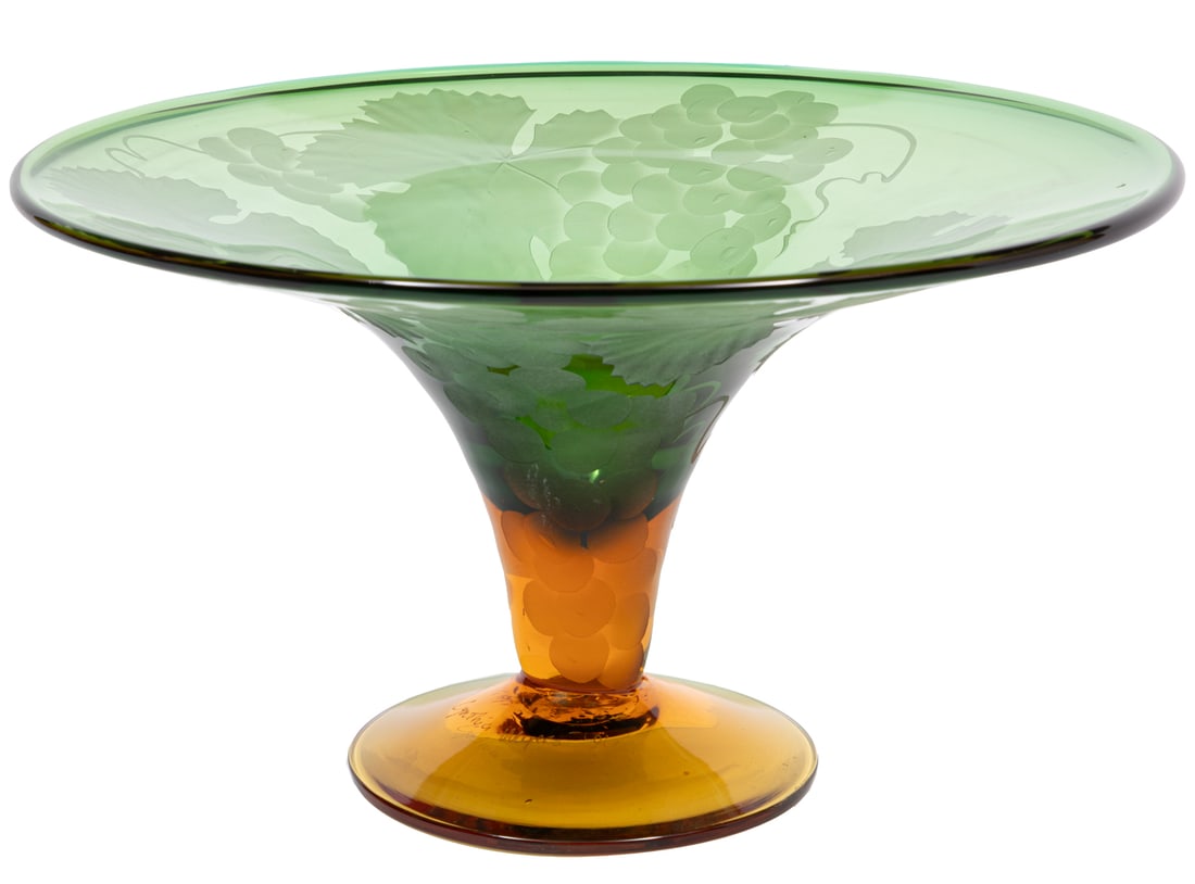Cynthia Myers Art Glass Center Bowl: Cynthia Myers Art Glass Center Bowl 1996, signed and dated, green to amber color, with an etched grape-leaf design, h. 7 1/2 in., dia. 13 1/4 in.