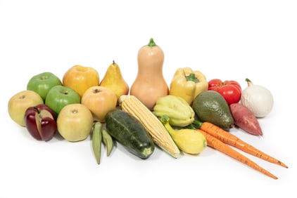 Mary Kirk Kelly (Alabama, 1918-2013),group of ceramic fruits and vegetables, together with sliced