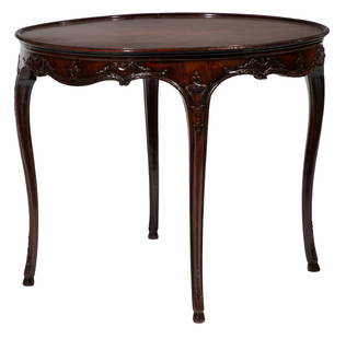 Georgian-Style Burl and Carved Walnut Center Table: Georgian-Style Burl and Carved Walnut Center Table, 20th c., dish top, scrolled frieze, cabriole legs, hoof feetIda Manheim Antiques, 409 Royal St., New Orleans.