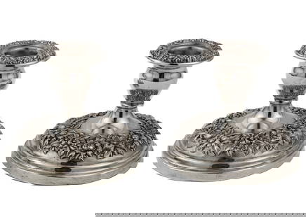 Pair of S. Kirk & Son Sterling Silver Repousse Candlesticks: Pair of S. Kirk & Son Sterling Silver Repousse Candlesticks,20th c., weighted bases.H. 3 3/4 in., dia. 4 1/4 in.