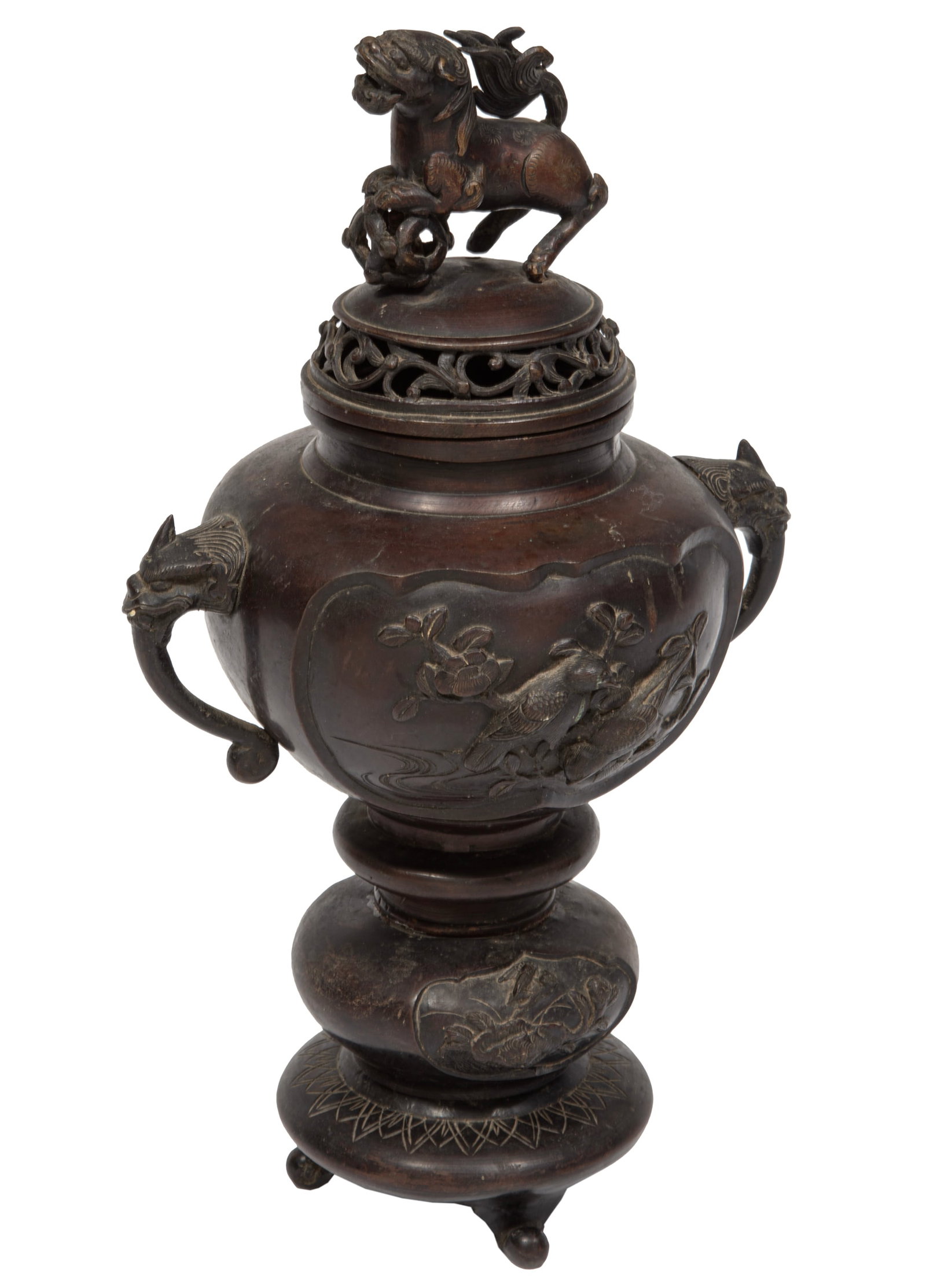 Asian Patinated Bronze Covered Censer on Stand: Asian Patinated Bronze Covered Censer on Stand , pierced domed cover with Buddhist lion finial, body with lion's mask handles, relief cast with bird and branch panels, h. 15 1/2 in.