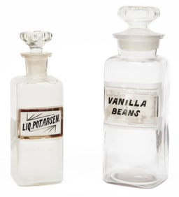 Two Antique Glass Apothecary Bottles