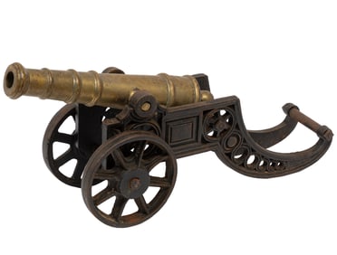 Minia Antique English Brass and Cast-Iron Model of a Cannon, turning wheels, together with a