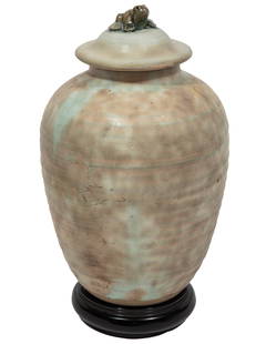 McCartys Jade Pottery Covered Urn: McCartys Jade Pottery Covered Urn,Merigold, MS, late 20th c., cover surmounted by figure of frog, mottled jade glaze, incised signature to underside, river symbol at foot,H. 8 in.