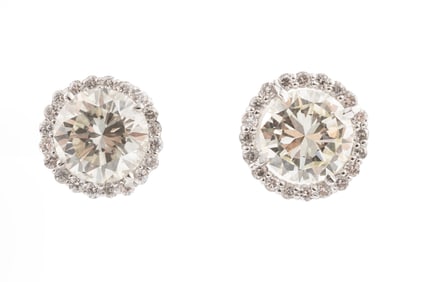 18 kt. White Gold and Diamond Stud Earrings