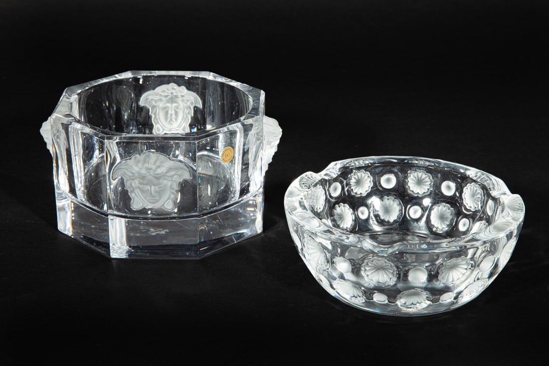 Versace for Rosenthal Crystal "Medusa" Wine Bottle Coaster and a Lalique Ashtray: Versace for Rosenthal Crystal "Medusa" Wine Bottle Coaster and a Lalique Ashtrayboth marked, coaster h. 3 1/4 in., dia. 5 in.; ashtray dia. 5 1/4 in.