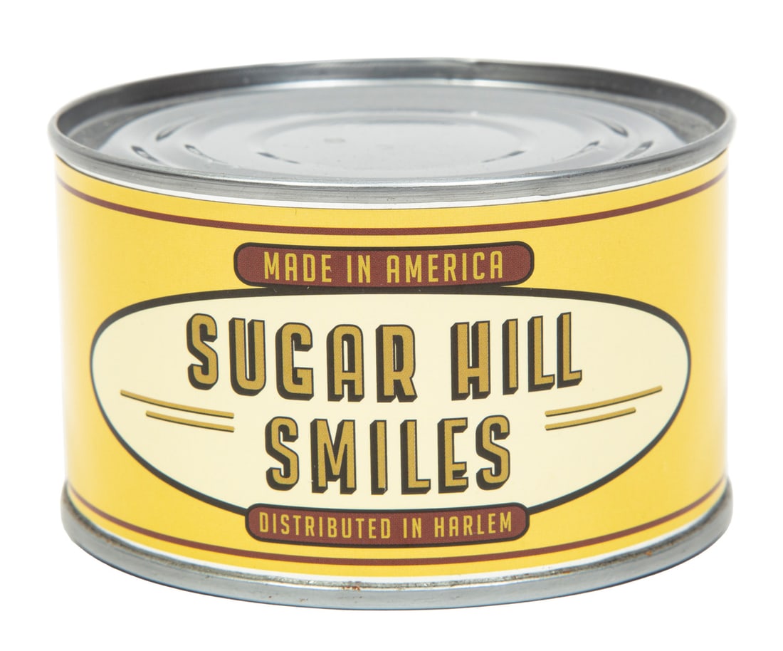 Nari Ward, Jamaican/New York b. 1963, "Sugar Hill Smiles", tin can and printed label: Nari WardJamaican/New York, b. 1963"Sugar Hill Smiles"tin can and printed label2014, initialed and dated on underside, created for the "If You Build It" site specific project by No Longer Empty arts o