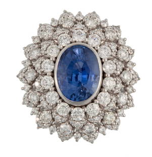 Platinum, Sapphire and Diamond Ring: Platinum, Sapphire and Diamond Ringcenter GIA certified no heat oval mixed cut blue sapphire, wt. approx. 5.75 cts.; elaborate bezel mounted with 126 round brilliant cut diamonds, total wt. approx. 2.