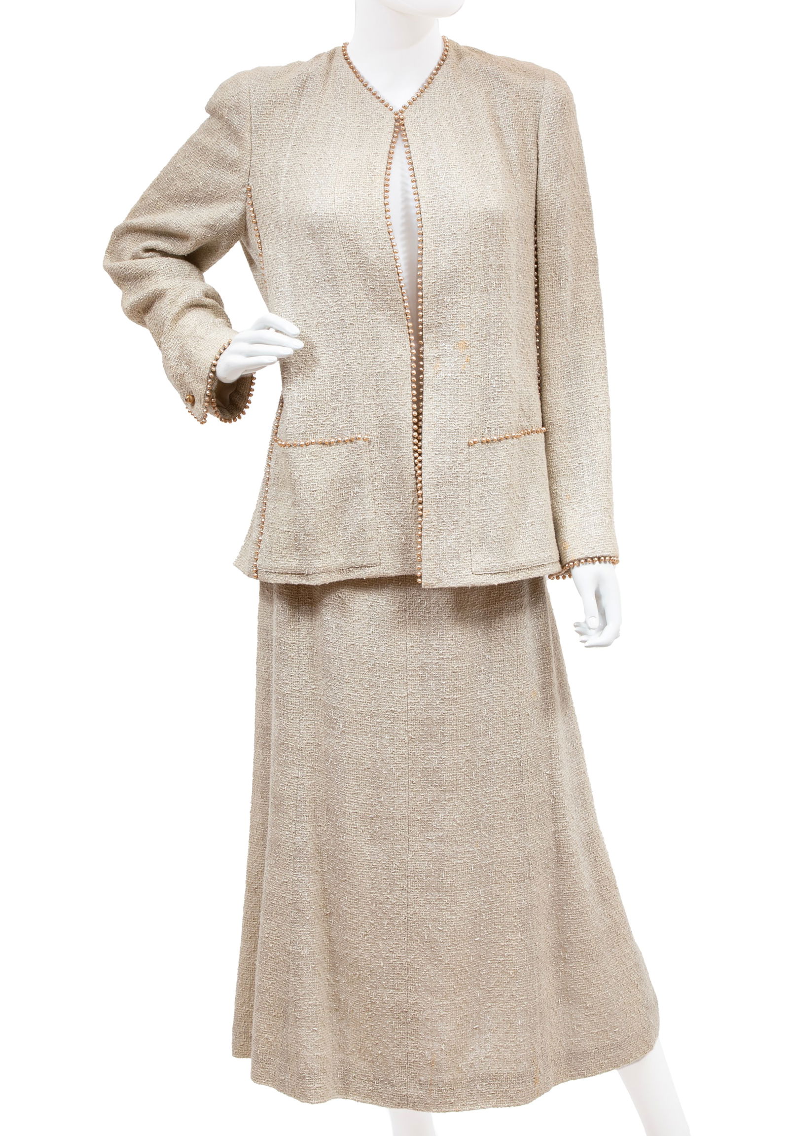 Vintage Chanel Beige Tweed Skirt Suit with Pearl Trim, Spring/Summer 1999: Vintage Chanel Beige Tweed Skirt Suit with Pearl Trim, Spring/Summer 1999Karl Lagerfeld, made in France, labeled, size 44.