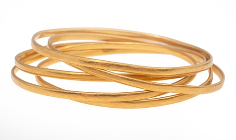 Five 22 kt. Yellow Gold Bangle Bracelets