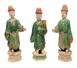 Three Chinese Green and Amber Partial Glazed Pottery Figures