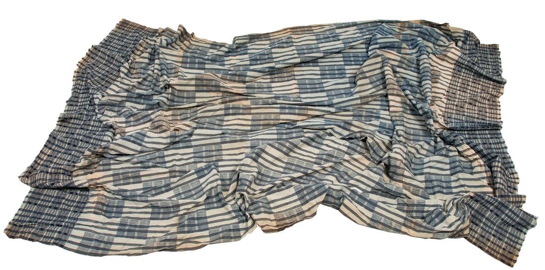 Homespun Indigo Coverlet: Homespun Indigo Coverlet smaller panels stitched together approximately 9' 4" x 6' 1"; dimensions variable