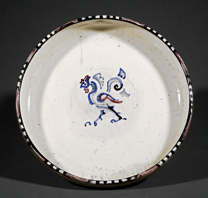 A Shearwater Pottery Low Bowl: A Shearwater Pottery Low Bowl, slip decorated by Walter Inglis Anderson (1903-1965) with a rooster in reserve, stamped mark, black, white and mulberry geometric patterned vine, height 2 in., diameter