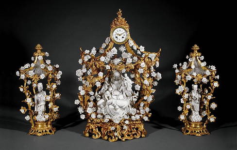 A Louis XV-Style "Blanc-de-Chine" Clock Ganriture: A Louis XV-Style Gilt Bronze and Chinese "Blanc-de-Chine" Mounted Three-Piece Clock Garniture, the figure of Budhai enclosed by elaborately modeled floral arbor, mounted with porcelain flowers, on scr