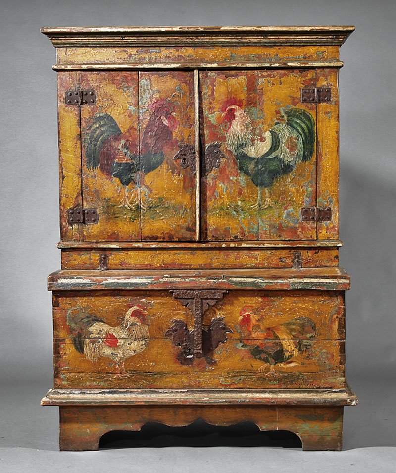 A Continental Provincial Cupboard: An Antique Continental Provincial Paint-Decorated Cupboard, probably Portuguese, upper case with step molded cornice over paired doors with strapwork hinges and rooster head escutcheon, shelves within