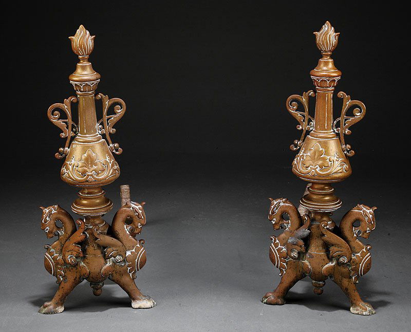 A Pair of Renaissance Revival Bronze Andirons: A Pair of Renaissance Revival Bronze Andirons, 19th c., vasiform standard with flame finial, on griffin legs, iron log rests, height 24 1/2 in., width 9 3/4 in., depth 21 in
