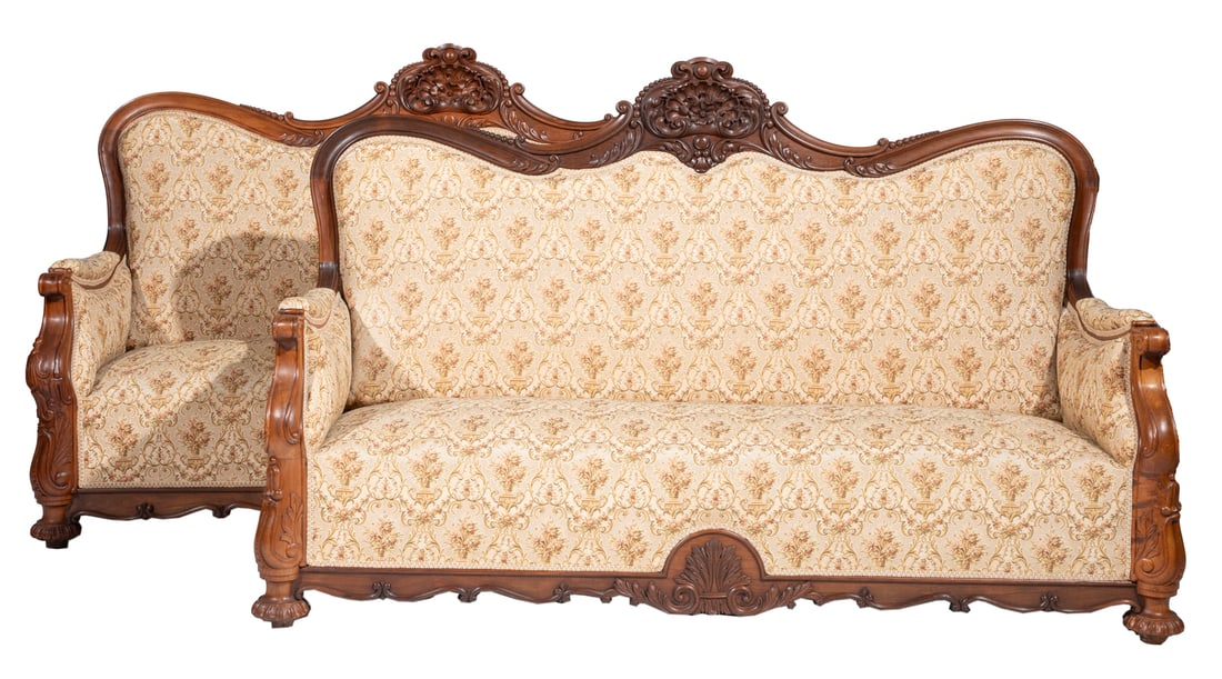 Pair of American Rococo Carved Rosewood Settees: Pair of American Rococo Carved Rosewood Settees 19th c., New York or Philadelphia, foliate, beaded scrolled crest, padded arms, molded seat rail with center carving, gadrooned disk feet 49 x 75 3/4 x