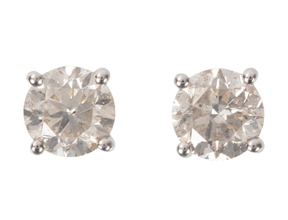 Pair of 14 kt. White Gold and Diamond Stud Earrings: Pair of 14 kt. White Gold and Diamond Stud Earrings 2 round brilliant cut diamonds, total wt. approx. 2.94 cts., I color, SI2 clarity; AIGL report. Please Note: Payment for all jewelry and all couture