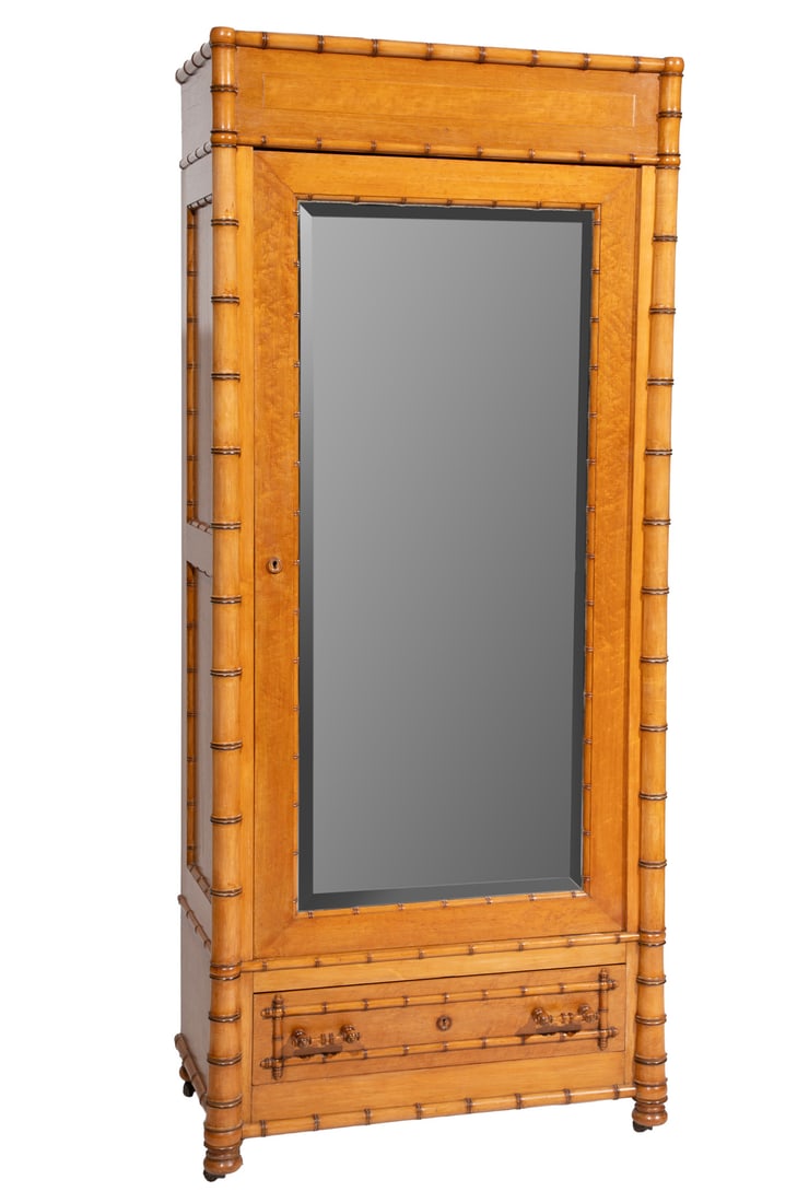 American Aesthetic Faux Bamboo Maple and Birdseye Maple Armoire: American Aesthetic Faux Bamboo Maple and Birdseye Maple ArmoireLate 19th c., attr. R. J. Horner, New York, carved bamboo frame and borders, mirrored paneled door, turned feet, casters85 x 37 x 20 1/2