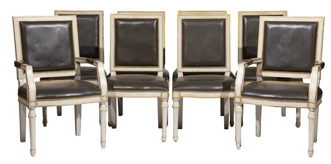 Set of Eight Directoire-Style Parcel Gilt and Creme Peinte Dining Chairs: Set of Eight Directoire-Style Parcel Gilt and Creme Peinte Dining Chairsnailhead leather upholstery, molded crest rail, padded arms, conforming seat, fluted tapered legsArm 38 1/2 x 24 x 19 1/2 in. (9