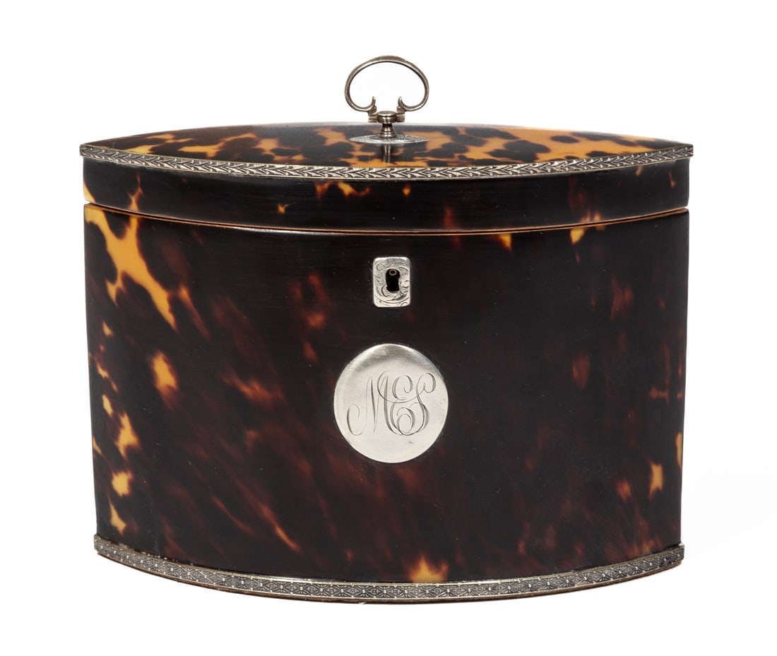 Georgian Tea Caddy: Georgian Tea Caddylozenge-form, lid and foot with silverplate banding, lidded interior compartment5 x 6 3/4 x 3 in. (12.7 x 17.1 x 7.6 cm.)