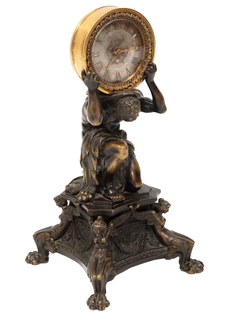 E.F. Caldwell Patinated Bronze Figural Mantel Clock: E.F. Caldwell Patinated Bronze Figural Mantel Clockc. 1906, manual wind movement marked "OMEGA WATCH Co. SWISS/ 17 JEWELS ADJUSTED/ 2 POSITIONS", silvered dial with engraved crescent moons and stars,
