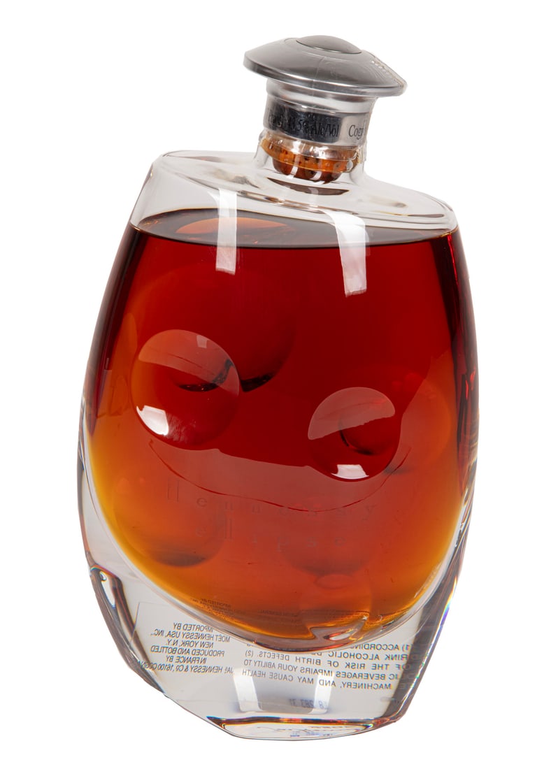 Hennessey Ellipse in Baccarat: Hennessey Ellipse in Baccarat1 bottle, 750 ml., number 2507, "Jas Hennessey", numbered "2507" and Baccarat mark on underside of bottle, with original presentation coffret, crystal stopper, booklet and