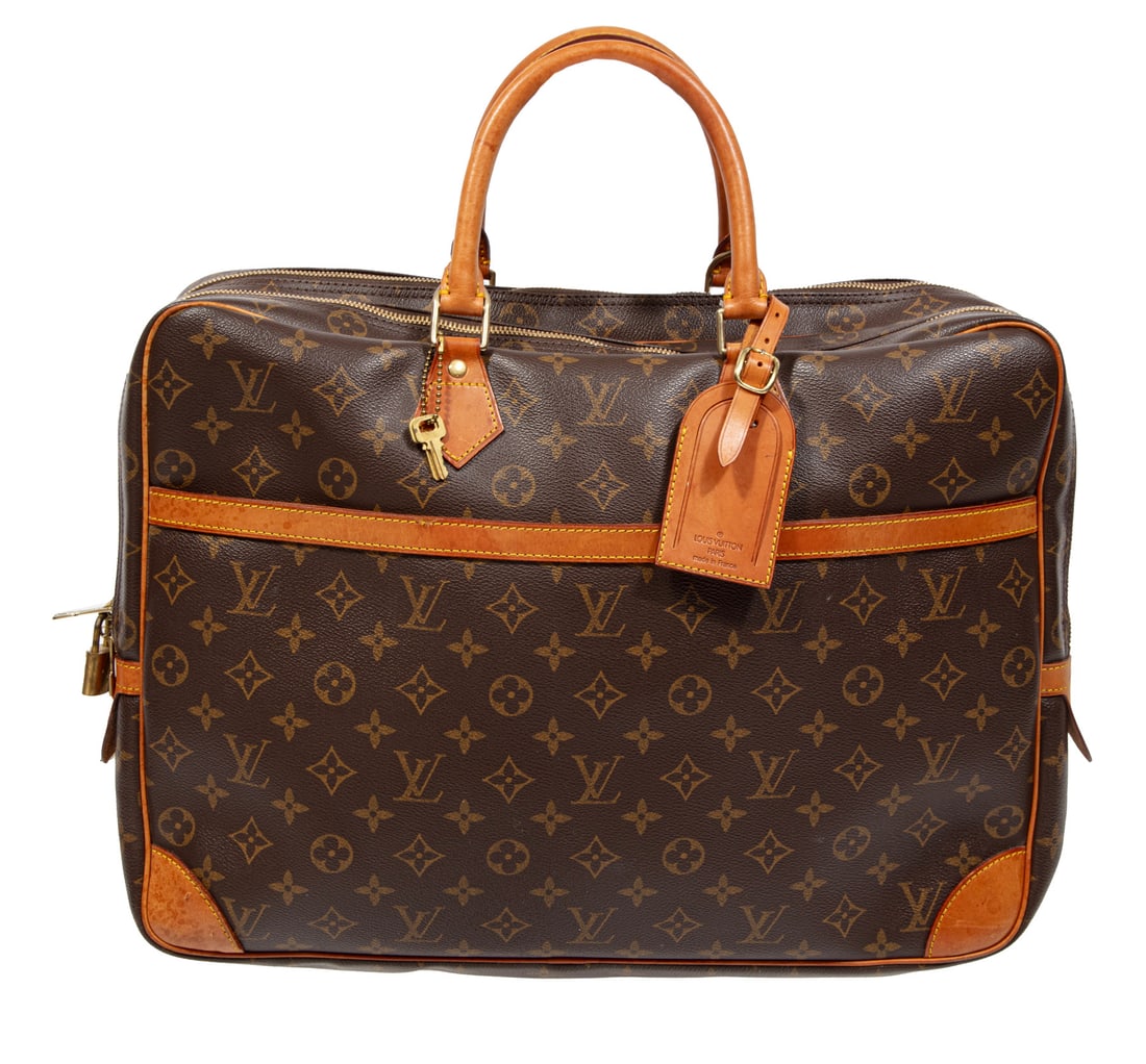 Vintage Louis Vuitton Portes Documents Voyage Suitcase in Brown Monogram Coated Canvas: Vintage Louis Vuitton Portes Documents Voyage Suitcase in Brown Monogram Coated Canvasgold-tone hardware, leather trim, h. 12 in., w. 16 in., d. 4 1/2 in.; with original lock and keysPlease Note: Paym