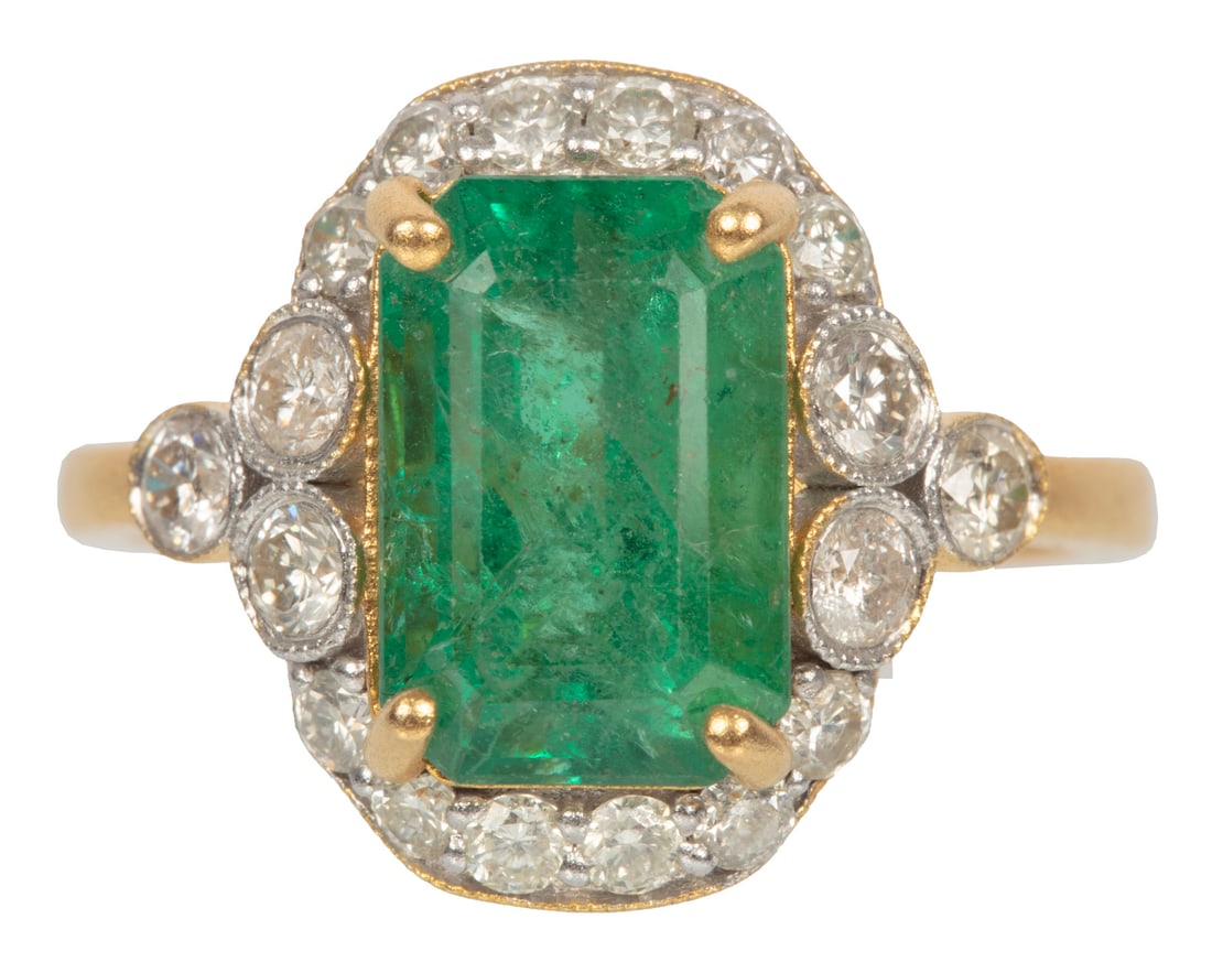 14 kt. Yellow Gold, Emerald and Diamond Ring: 14 kt. Yellow Gold, Emerald and Diamond Ringcenter octagonal step faceted cut emerald, wt. approx. 3.10 cts.; mounted with 0.72 cts. of round brilliant cut diamonds; size 6.75; GGA report.Please Note: