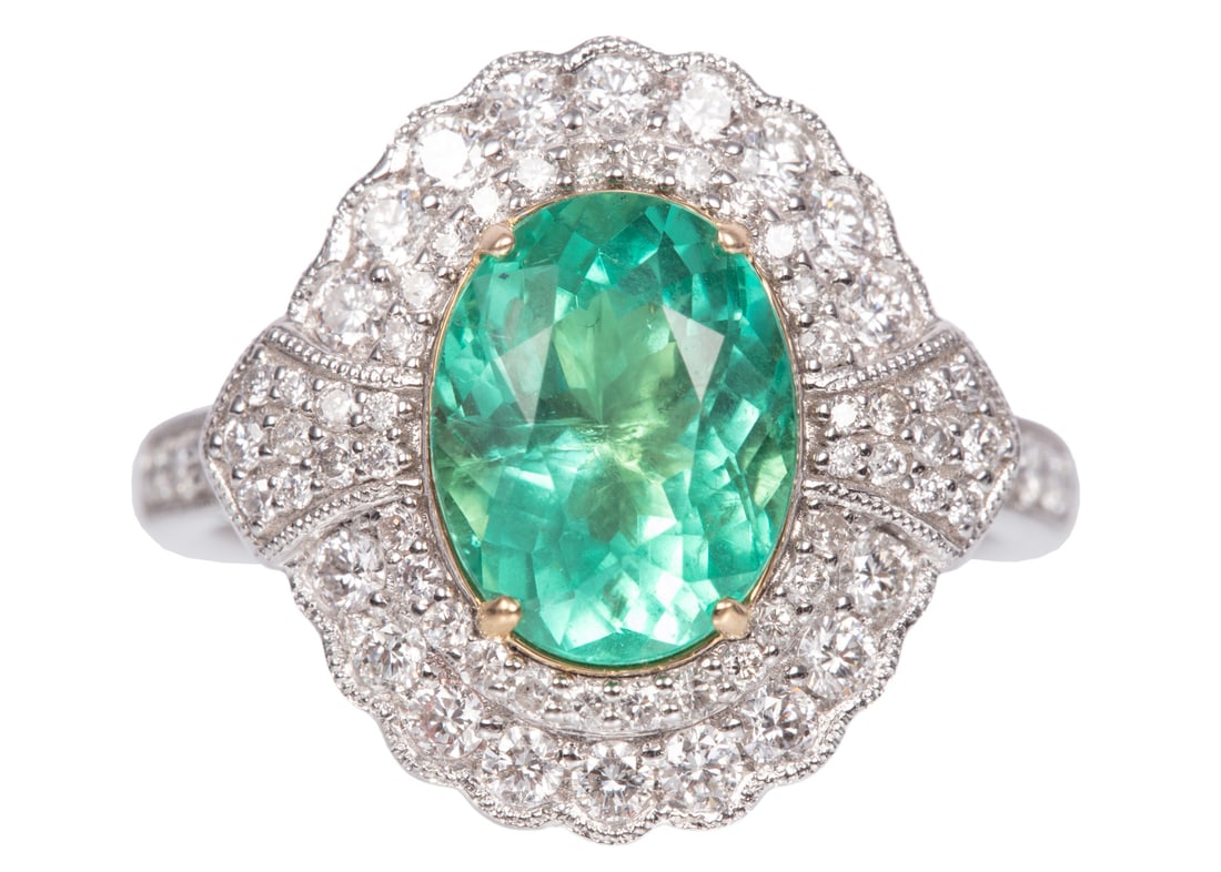 Platinum, 18 kt. Yellow Gold, Emerald and Diamond Ring: Platinum, 18 kt. Yellow Gold, Emerald and Diamond Ringcenter oval brilliant faceted cut Brazilian emerald, wt. approx. 2.31 cts.; bezel with 0.70 ct. of round brilliant cut diamonds; size 7; GGA and G