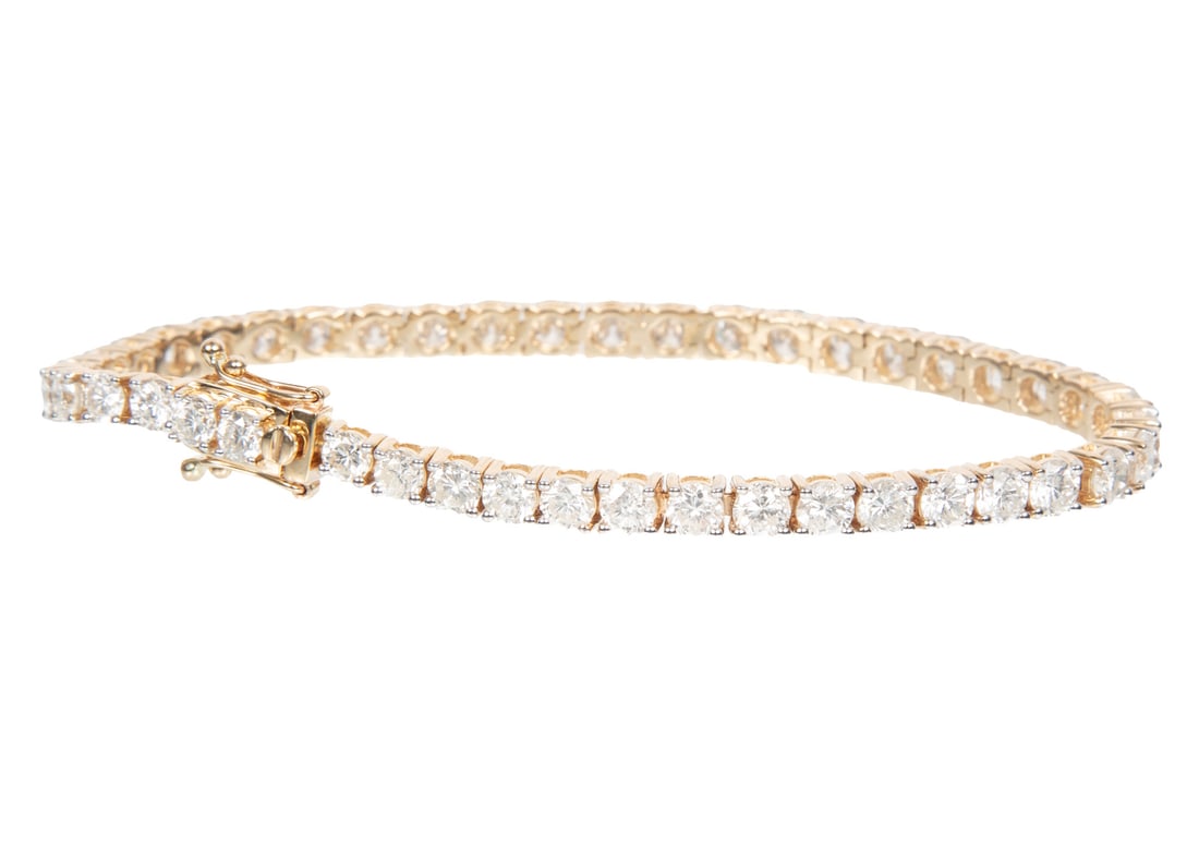 14 kt. Yellow Gold and Diamond Tennis Bracelet: 14 kt. Yellow Gold and Diamond Tennis Braceletmounted with 44 round brilliant cut diamonds, total wt. approx. 10.32 cts., F-G colors, SI-I clarity; l. 7 in.; IAS report.Please Note: Payment for all je
