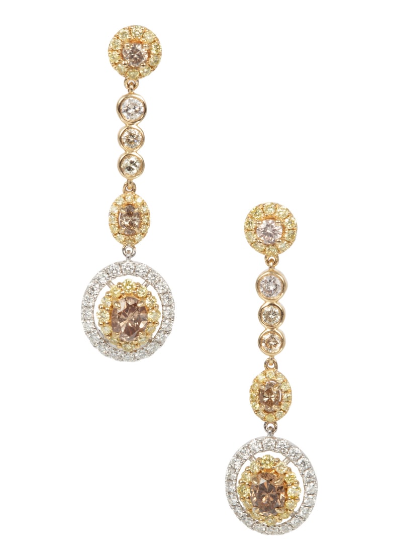 Pair of 14 kt. Two-Tone Gold and Diamond Dangle Earrings: Pair of 14 kt. Two-Tone Gold and Diamond Dangle Earringsmounted with 2 oval shape light brown diamonds, total wt. approx. 0.80 ct.; and 67 fancy light yellow round brilliant cut diamonds, total wt. ap
