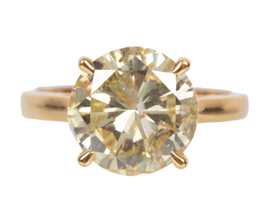 14 kt. Yellow Gold and Diamond Ring: 14 kt. Yellow Gold and Diamond Ringcenter round diamond, wt. approx. 4.91 cts.; 2.98 dwts.Please Note: Payment for all jewelry and all couture items MUST be made by cash, check or wire transfer.