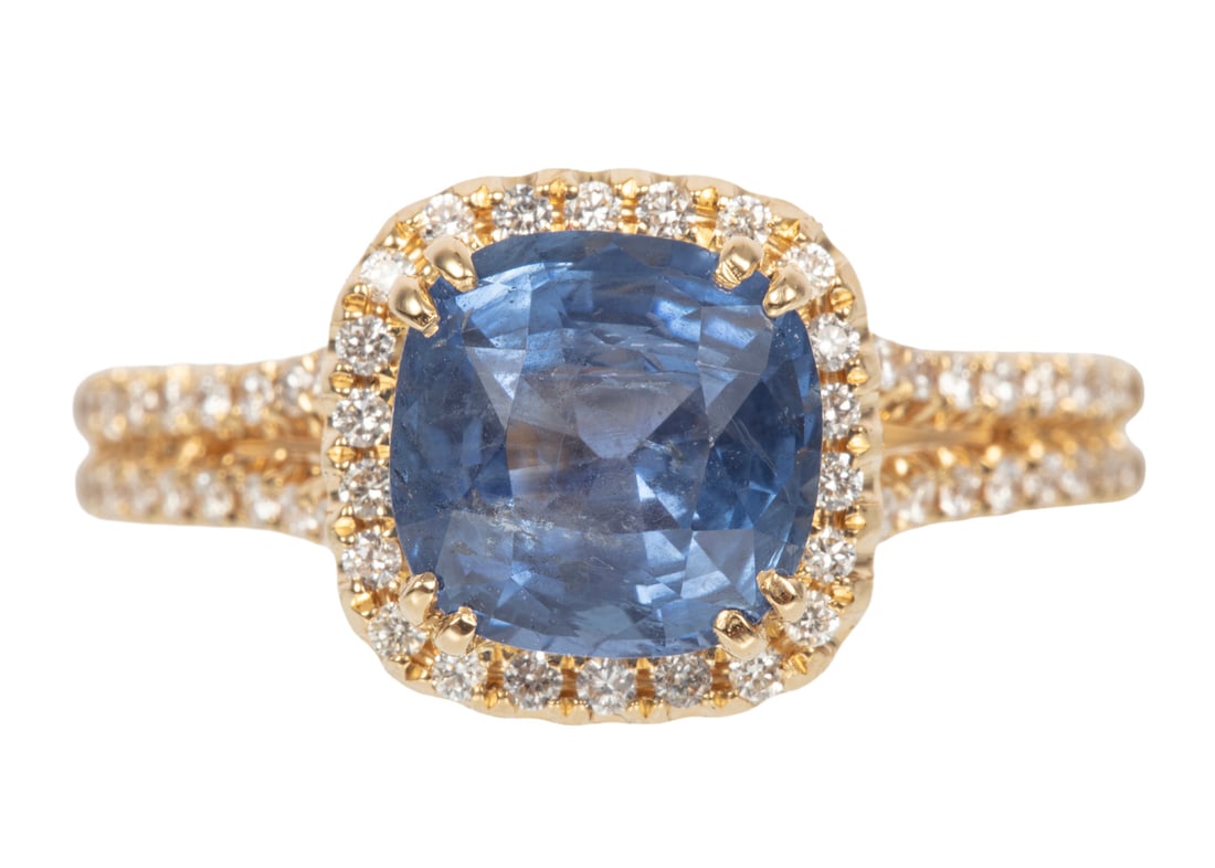 18 kt. Yellow Gold, Sapphire and Diamond Ring: 18 kt. Yellow Gold, Sapphire and Diamond Ringcenter cushion brilliant step cut sapphire, wt. approx. 2.48 cts.; band and bezel with 0.29 ct. of round brilliant cut diamonds; size 6.5; AIG; report.Plea