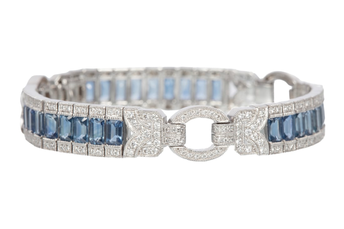 Art Deco Style Platinum, Sapphire and Diamond Line Bracelet: Art Deco Style Platinum, Sapphire and Diamond Line Braceletmounted with 27 octagonal step faceted cut blue sapphires, total wt. approx. 10.38 cts.; and with approx. 1.36 cts. of round brilliant cut di