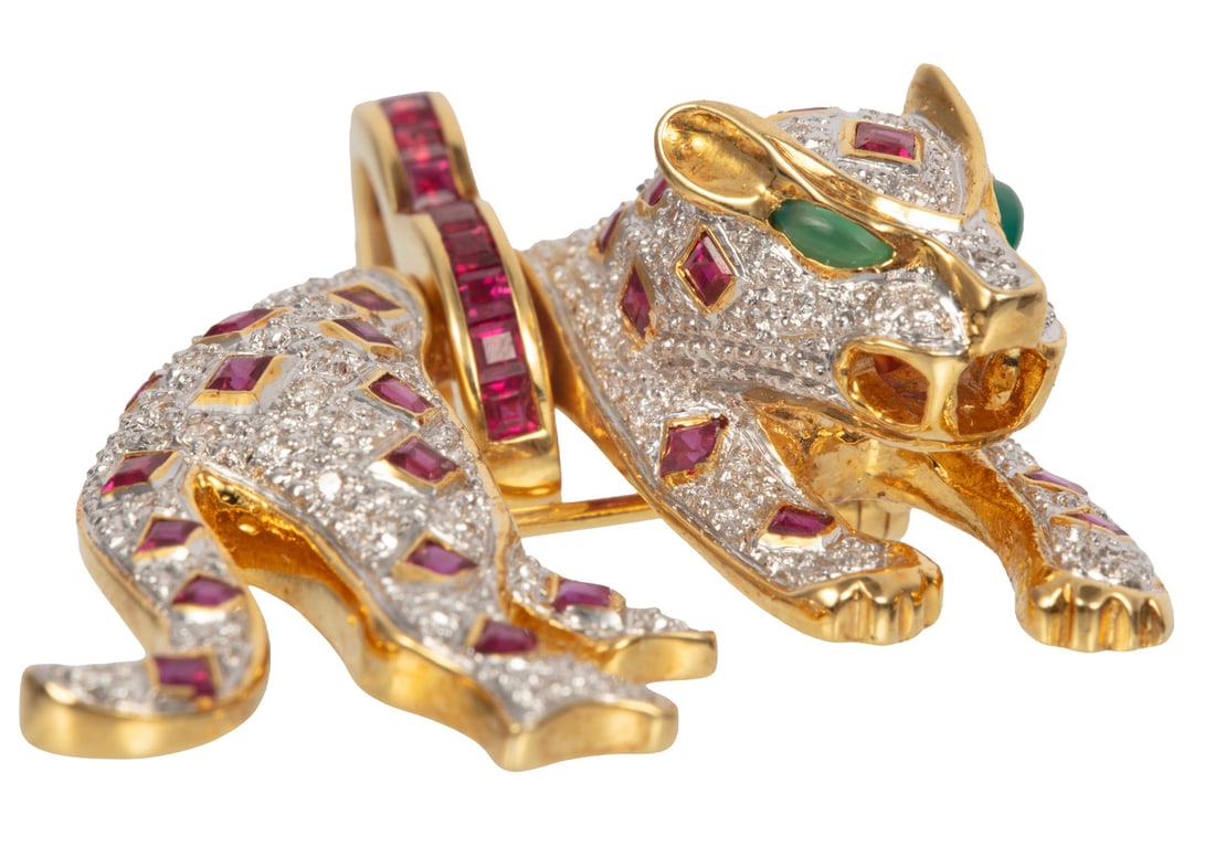 18 kt. Yellow Gold, Diamond, Ruby and Emerald Panther Pendant Brooch: 18 kt. Yellow Gold, Diamond, Ruby and Emerald Panther Pendant Broochmarked 750, body with pave set round diamonds, 2 cabochon emerald eyes, and numerous bezel set ruby spots; removable bail with numer