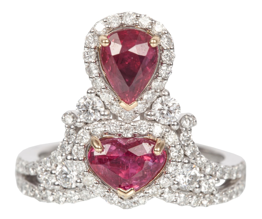 Platinum, 18 kt Yellow Gold, Ruby and Diamond Ring: Platinum, 18 kt Yellow Gold, Ruby and Diamond Ringmounted with a pear shape ruby and a heart shape ruby, total wt. approx. 2.03 cts.; and 0.89 ct. of round brilliant cut diamonds; size 7; GGA and GIA