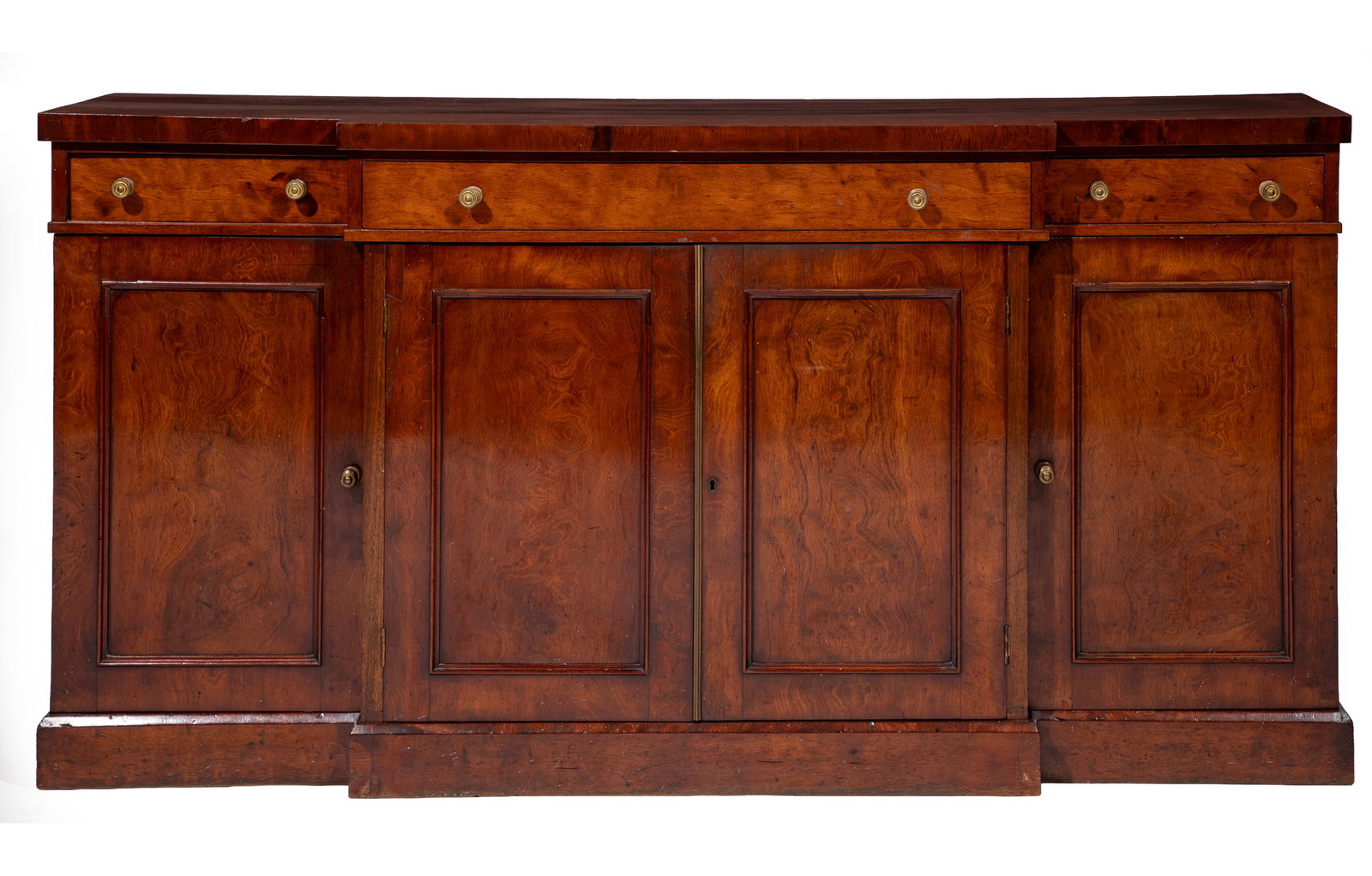 Regency-Style Mahogany Breakfront Credenza: Regency-Style Mahogany Breakfront Credenza Late 19th/early 20th c. three frieze drawers, molded paneled doors, plinth base 36 1/2 x 72 1/2 x 18 in. (92.7 x 184.2 x 45.7 cm.)