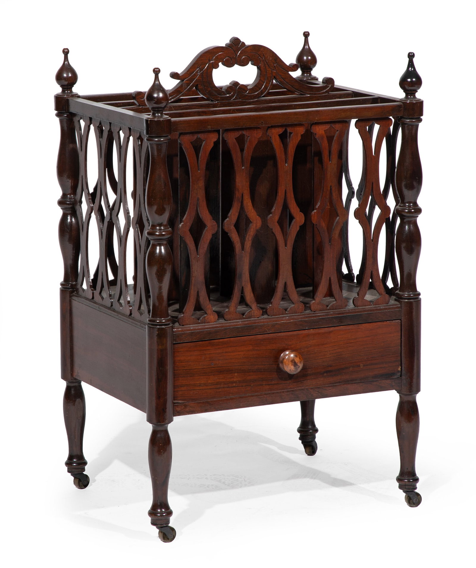 American Carved Rosewood Canterbury: American Carved Rosewood Canterbury mid-19th c., fitted drawer opening each side, baluster supports, brass casters, 27 x 17 x 13 in. (68.6 x 43.2 x 33 cm.)
