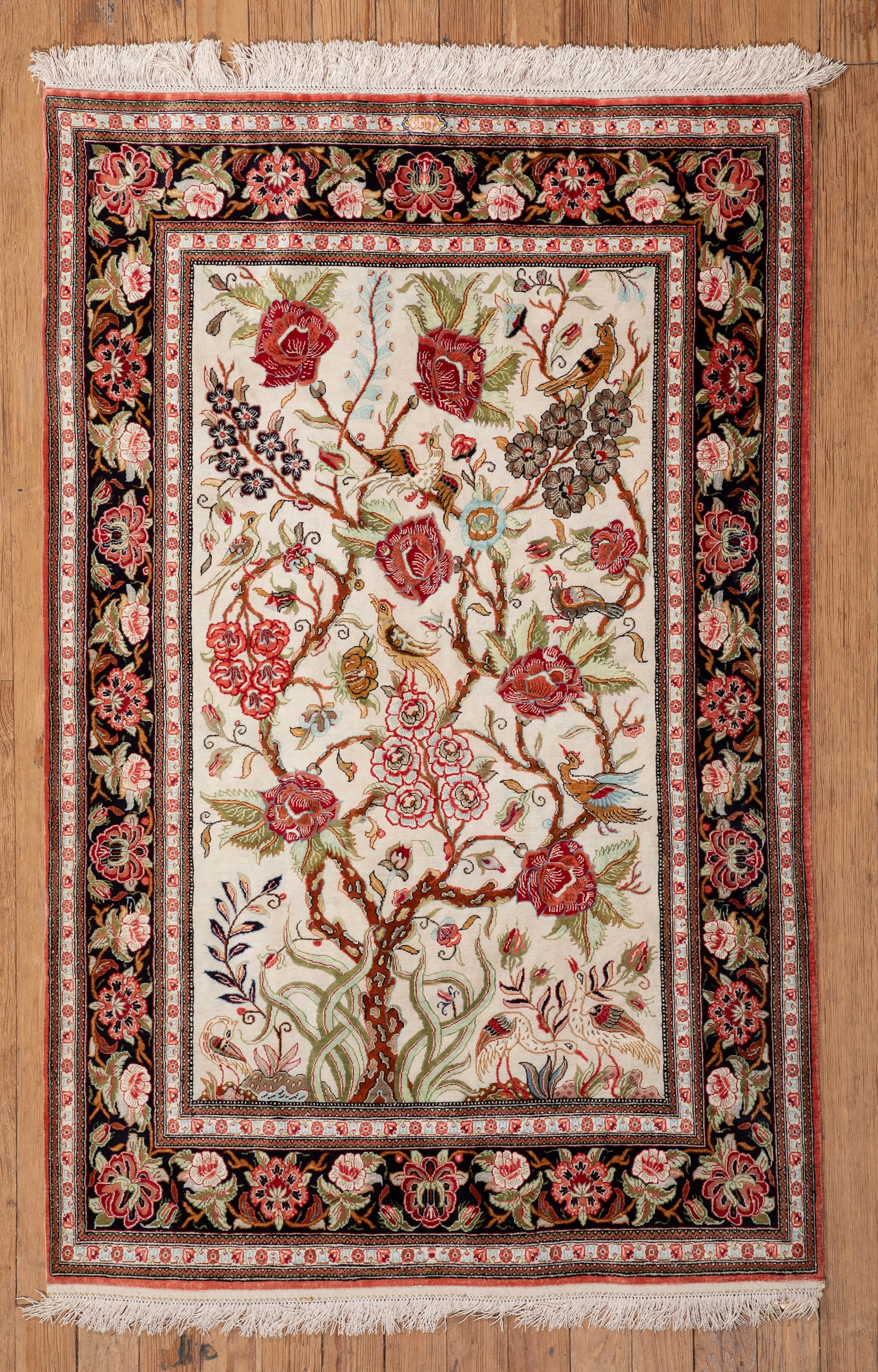 Persian Silk Qum Rug: Persian Silk Qum Rug fitted with hanging sleeve, 3 ft. 5 in. x 5 ft. 6 in.
