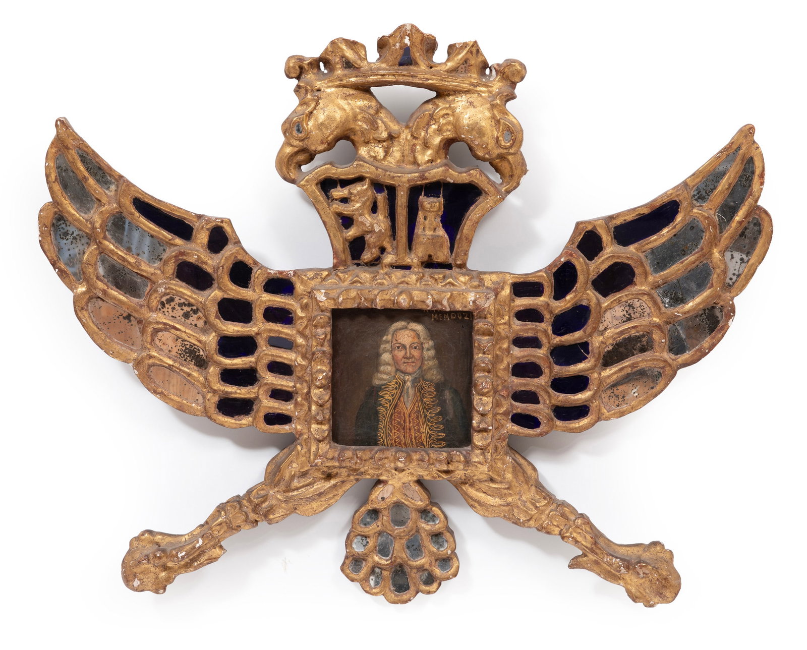 Spanish Colonial Giltwood Mirrored Frame: Spanish Colonial Giltwood Mirrored Frame late 18th/early 19th c., herald form, inset with blue glass and mirrors, centered by oil on canvas portrait, signed "Antoino de Mendoza", frame h. 24 in., w. 3