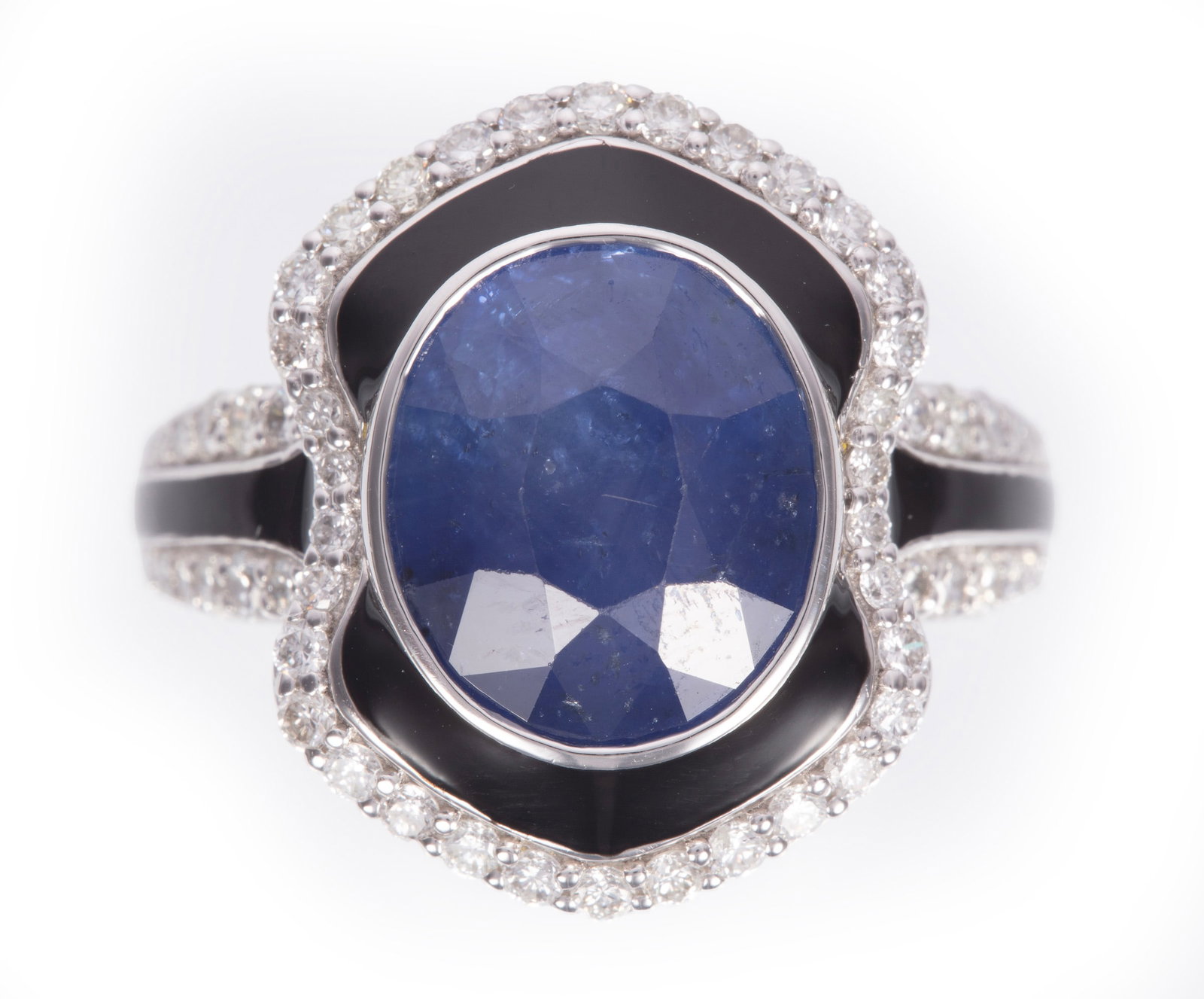 Art Deco Style Platinum, Ceylon Sapphire, Diamond and Enamel Ring: Art Deco Style Platinum, Ceylon Sapphire, Diamond and Enamel Ring center bezel set oval mixed cut Sri Lankan sapphire, wt. approx. 5.26 cts.; mounted with 0.67 ct. of round brilliant cut diamonds; siz