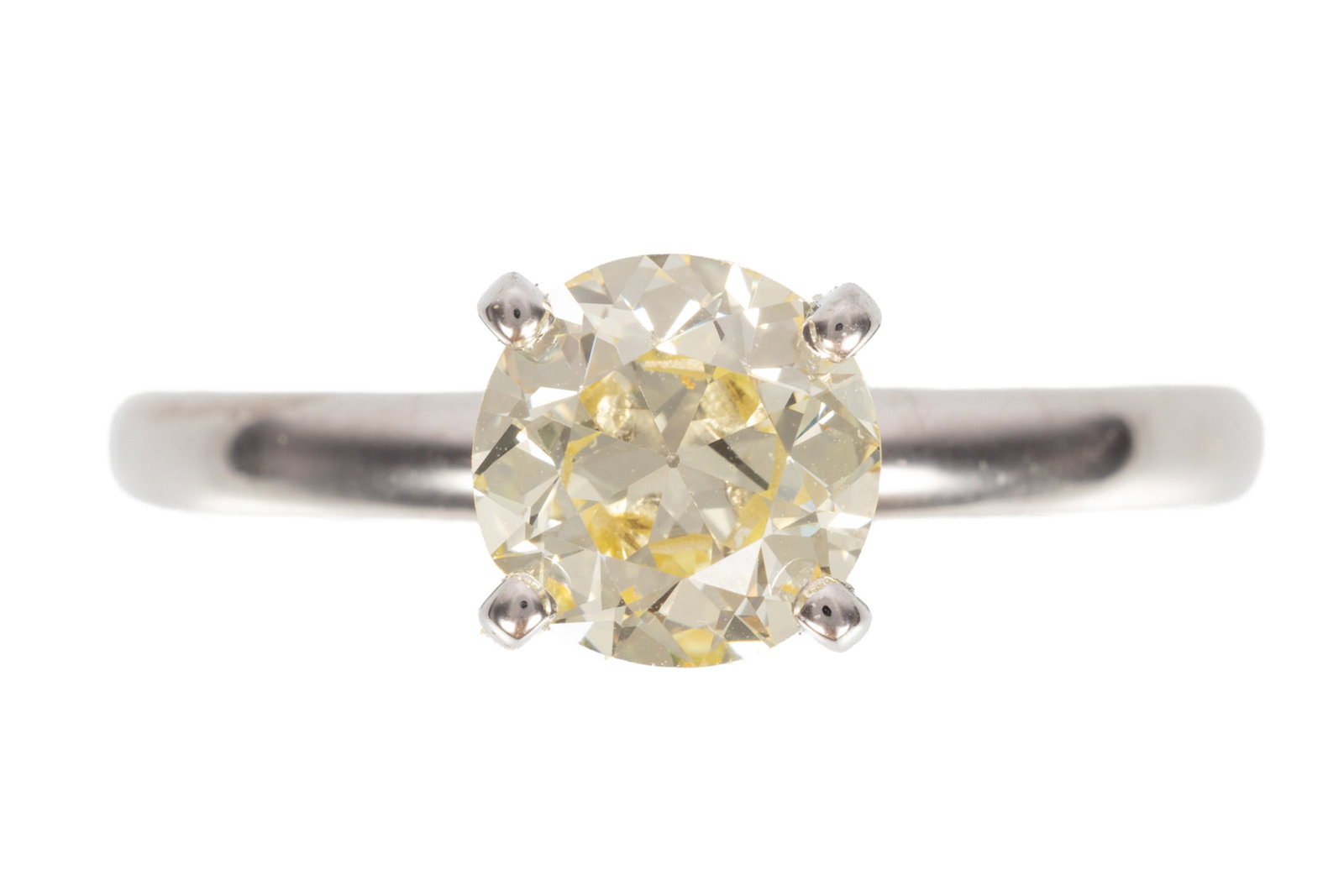 14 kt. White Gold and Diamond Solitaire Ring: 14 kt. White Gold and Diamond Solitaire Ring center round diamond, wt. approx. 1.20 cts.; 1.54 dwts.; size 7.25 Please Note: Payment for all jewelry and all couture items MUST be made by cash, check o
