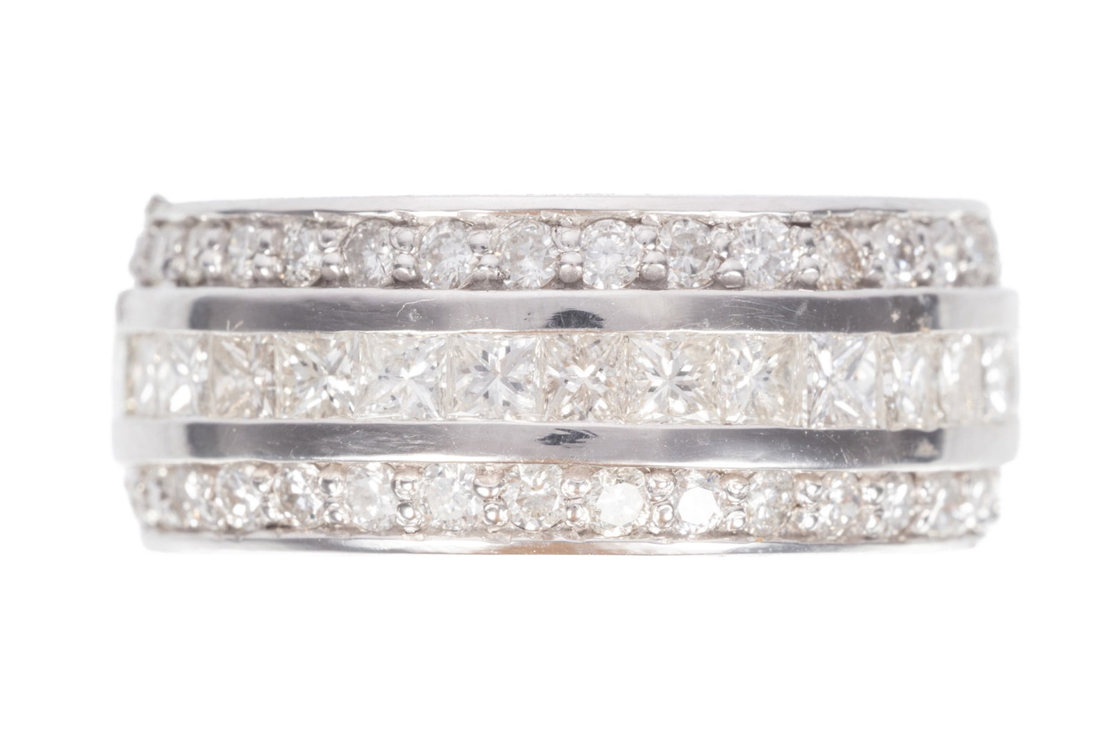 14 kt. White Gold and Diamond Eternity Band Ring: 14 kt. White Gold and Diamond Eternity Band Ring mounted with 3.59 cts. of round diamonds; size 7; 5.72 dwts. Please Note: Payment for all jewelry and all couture items MUST be made by cash, check or 