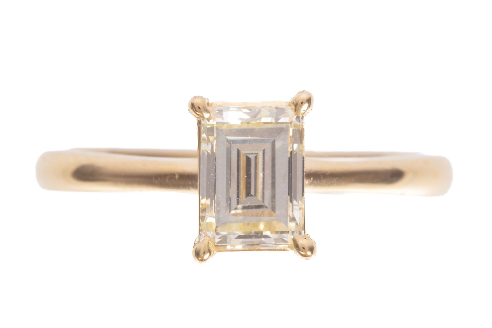 14 kt. Yellow Gold and Diamond Solitaire Ring: 14 kt. Yellow Gold and Diamond Solitaire Ring center emerald cut diamond, wt. approx. 1.00 ct.; size 7. Please Note: Payment for all jewelry and all couture items MUST be made by cash, check or wire t
