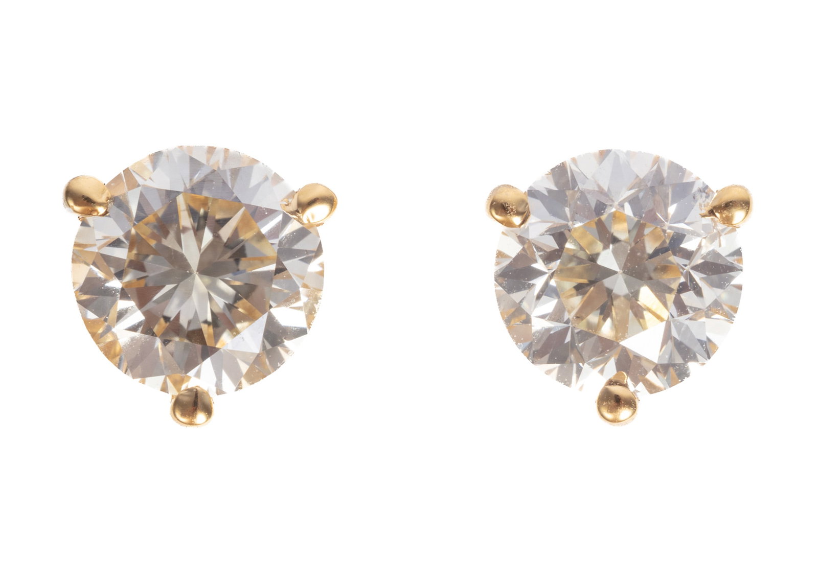 Pair of 14 kt. Yellow Gold and Diamond Martini Stud Earrings: Pair of 14 kt. Yellow Gold and Diamond Martini Stud Earrings 2 round diamonds, wt. approx. 1.06 ct. and 1.00 ct.; 0.96 dwt. Please Note: Payment for all jewelry and all couture items MUST be made by c