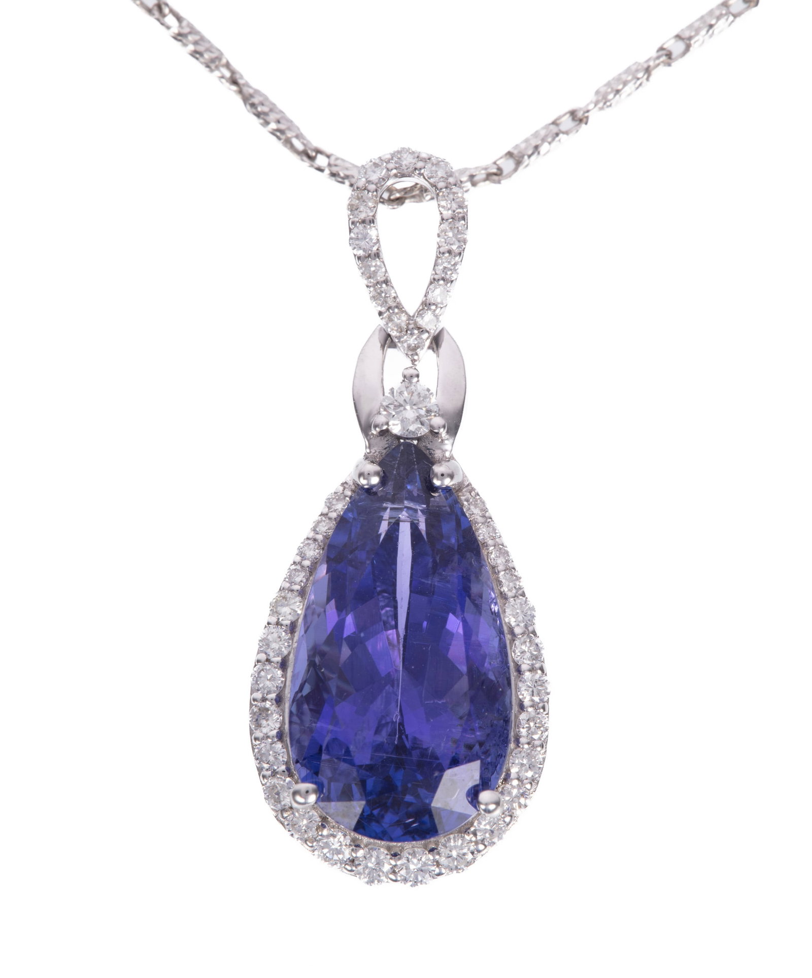 14 kt. White Gold, Tanzanite and Diamond Pendant on Chain: 14 kt. White Gold, Tanzanite and Diamond Pendant on Chain center pear shape mixed cut tanzanite, wt. approx. 5.22 cts.; mounted with 0.31 ct. of round brilliant cut diamonds; pendant l. 1 in.; chain l